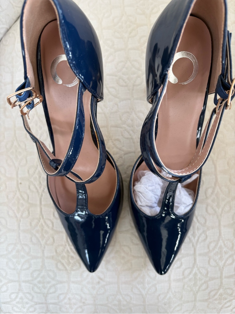 Patent Navy Pointed-Toe T-Strap Heels with Gold Buckle